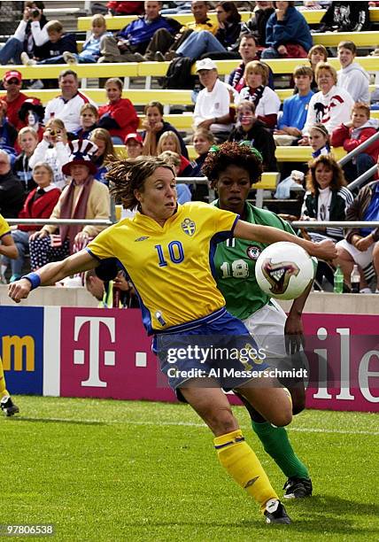 Sweden forward Hanna Ljungberg drives to the goal Sunday, September 28, 2003 at Columbus Crew Stadium, Columbus, Ohio, during the opening round of...