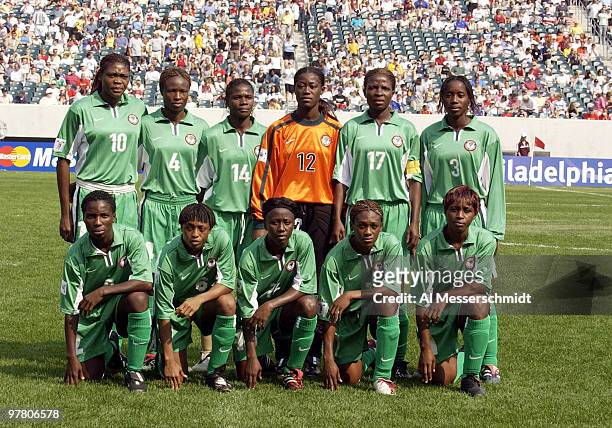 Nigeria team poses for a photo during pre-match introductions Saturday, September 20, 2003 at Lincoln Financial Field, Philadelphia. Korea DPR...