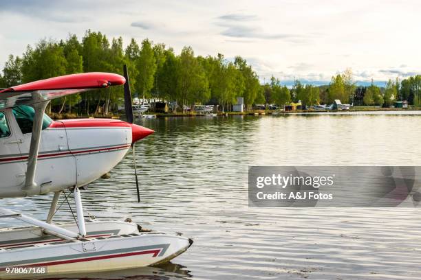 seaplane at sunset - anchorage alaska stock pictures, royalty-free photos & images