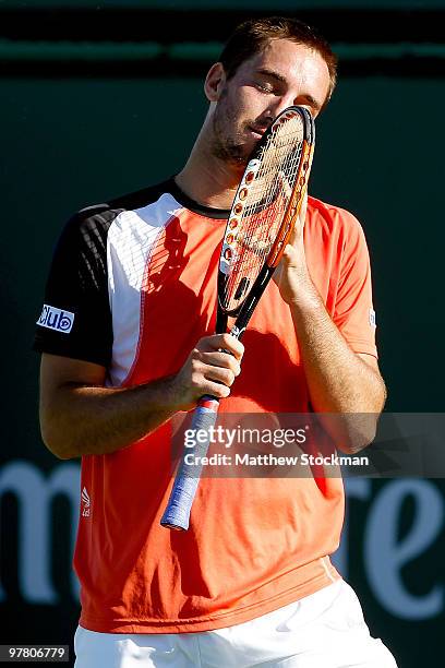 Viktor Troicki of Serbia reacts to a lost point to Tomas Berdych of the Czech Republic during the BNP Paribas Open on March 17, 2010 at the Indian...