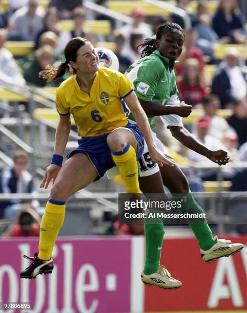 Sweden midfielder Malin Mostroem leaps for a header Sunday, September 28, 2003 at Columbus Crew Stadium, Columbus, Ohio, during the opening round of...