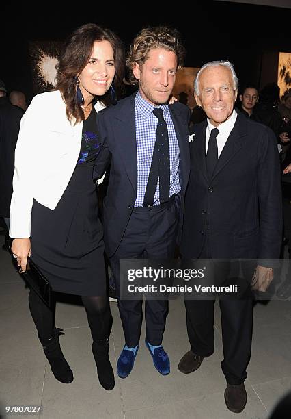 Giorgio Armani, Lapo Elkann and Roberta Armani attend Richard Hambleton Exhibition during Milan Fashion Week womenswear Autumn/Winter 2010 show on...