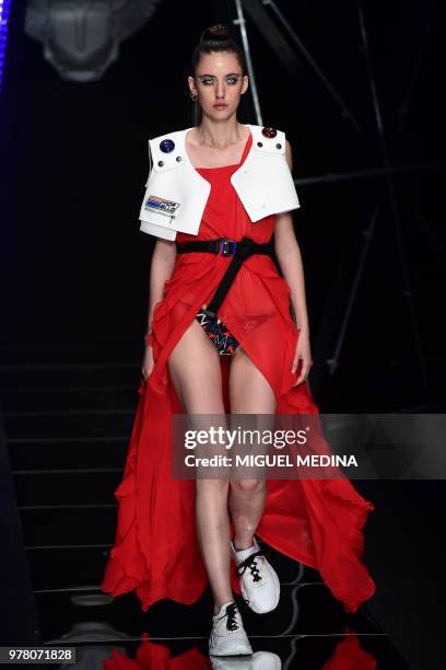 Model presents a creation by Frankie Morello fashion house during the men and women's spring/summer 2019 collection fashion show in Milan, on June...