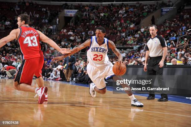 Lou Williams of the Philadelphia 76ers drives against Kris Humphries of the New Jersey Nets during the game on March 17, 2010 at the Wachovia Center...