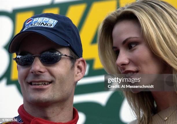 Jeff Gordon and Amanda Church share the victory stand Sunday, October 19, 2003 at the NASCAR Subway 500 at Martinsville Speedway, Martinsville,...