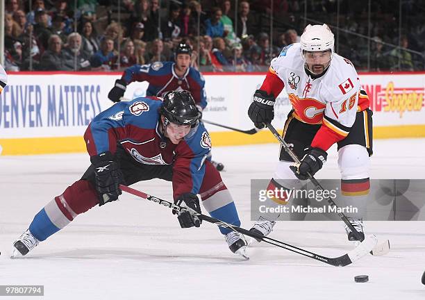 Matt Duchene of the Colorado Avalanche skates against Nigel Daws of the Calgary Flames at the Pepsi Center on March 17, 2010 in Denver, Colorado.