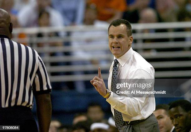 Florida men's basketball coach Billy Donovan protests a foul call January 3, 2004 at the Stephen C. O'Connell Center, Gainesville, Florida. FSU was...