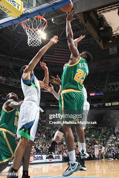 Wesley Mathews of the Utah Jazz goes up for the shot against Ryan Hollins of the Minnesota Timberwolves at EnergySolutions Arena on March 17, 2010 in...