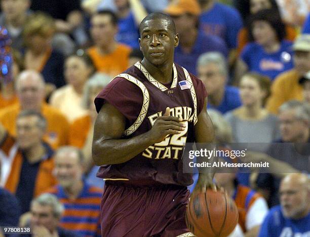 Florida State University guardTim Pickett, who scored 25 points, drives up court January 3, 2004 at the Stephen C. O'Connell Center, Gainesville,...