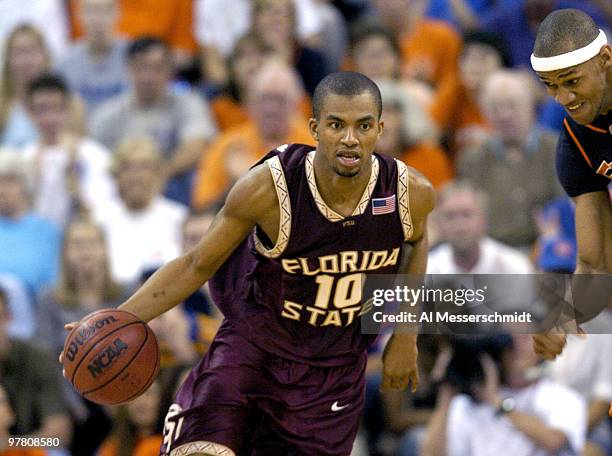 Florida State University guard Nate Johnson drives to the basket January 3, 2004 at the Stephen C. O'Connell Center, Gainesville, Florida. FSU was...