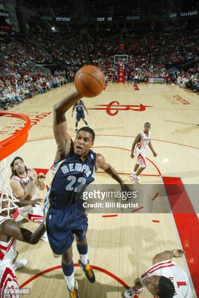 Rudy Gay of the Memphis Grizzlies shoots the ball over Trevor Ariza of the Houston Rockets on March 17, 2010 at the Toyota Center in Houston, Texas....