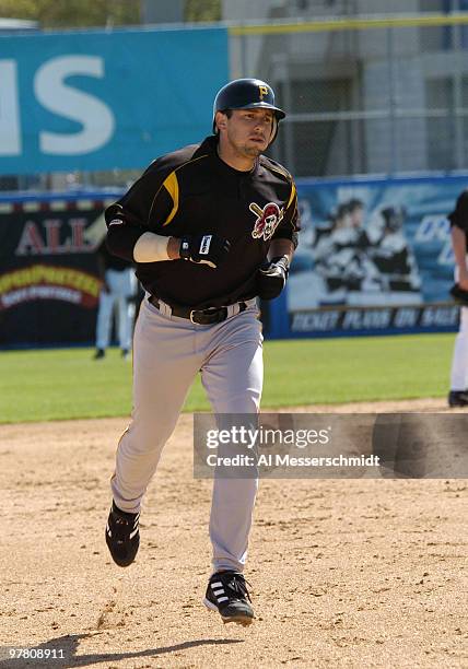 Pittsburgh Pirates catcher Humberto Cota rounds second base after a home run March 8, 2004 in a spring training game against the Pittsburgh Pirates...