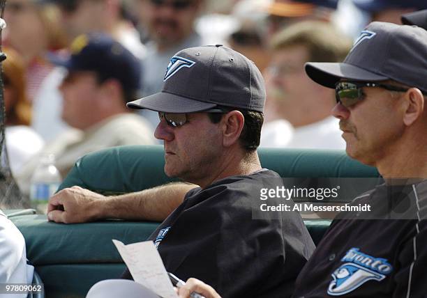 Toronto Blue Jays manager Carlos Tosca watches play March 9, 2004 during a spring training game against the Detroit Tigers in Lakeland, Florida.
