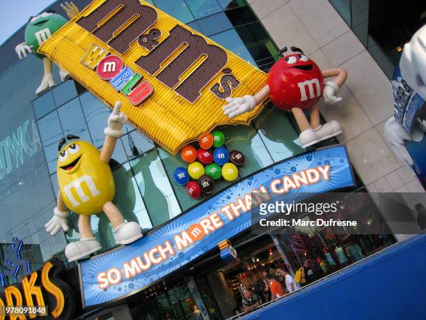 facade of the m&m candy store in las vegas during day - letter m stock pictures, royalty-free photos & images