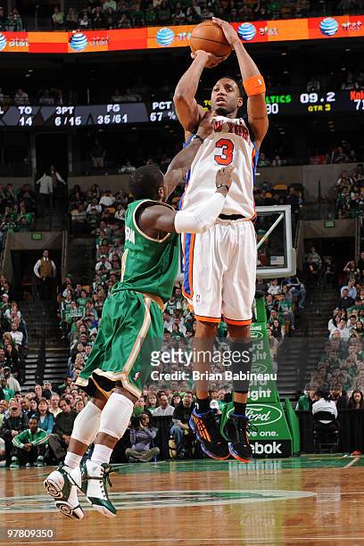 Tracy McGrady of the New York Knicks goes up for a shot against Nate Robinson of the Boston Celtics on March 17, 2010 at the TD Garden in Boston,...