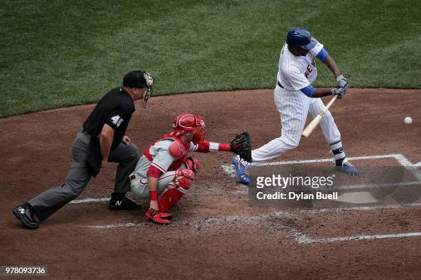 Lorenzo Cain of the Milwaukee Brewers hits a single in the fourth inning against the Philadelphia Phillies at Miller Park on June 16, 2018 in...