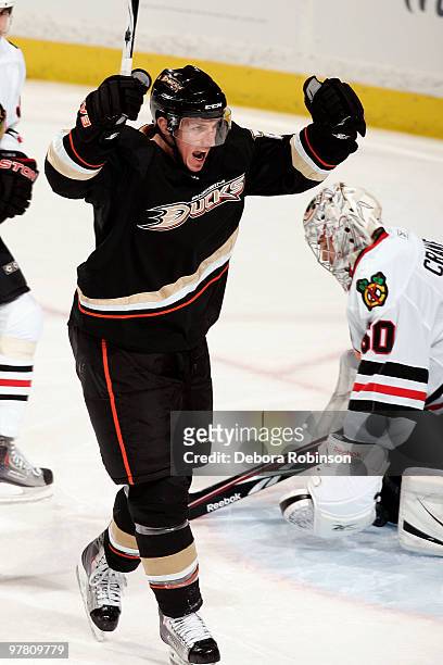 Ryan Carter of the Anaheim Ducks celebrates his assist to teammate Bobby Ryan during the game against the Chicago Blackhawks on March 17, 2010 at...