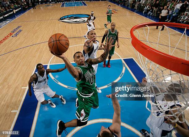 Acie Law of the Chicago Bulls goes up for the layup against the Dallas Mavericks during a game at the American Airlines Center on March 17, 2010 in...