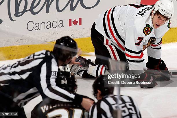 Brent Seabrook of the Chicago Blackhawks gets up from the ice after being hit by James Wisniewski of the Anaheim Ducks in the second period during...