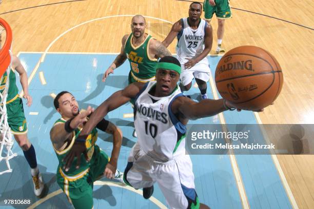 Jonny Flynn of the Minnesota Timberwolves goes up for the layup against Deron Williams of the Utah Jazz at EnergySolutions Arena on March 17, 2010 in...