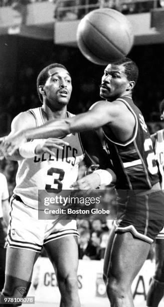 Boston Celtics' Dennis Johnson looks toward the ball as the Bucks' Ricky Pierce guards. The Boston Celtics host the Milwaukee Bucks in a regular...