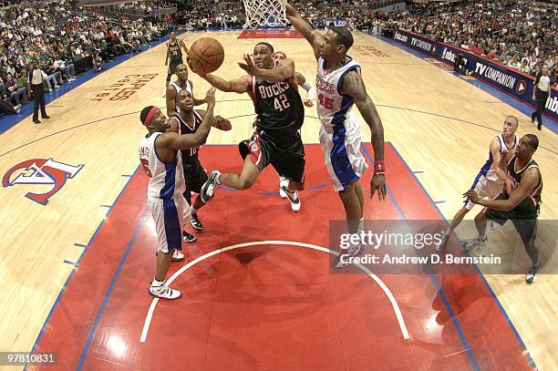 Charlie Bell of the Milwaukee Bucks goes up for a shot against Rasual Butler of the Los Angeles Clippers at Staples Center on March 17, 2010 in Los...