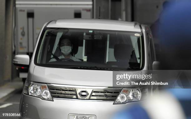 Police car carrying former Ito City Mayor Hiromi Tsukuda is seen as he is sent to prosecutors after his arrest on suspicion of bribery at Harajuku...