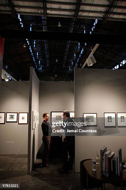 Patrons attend the gala preview of the AIPAD Photography Show at the Park Avenue Armory on March 17, 2010 in New York City.