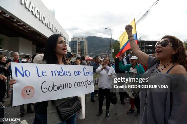 Supporters of Ecuadoran former president Rafael Correa, protest outside the National Court of Justice in Quito on June 18 after judge Daniela Camacho...