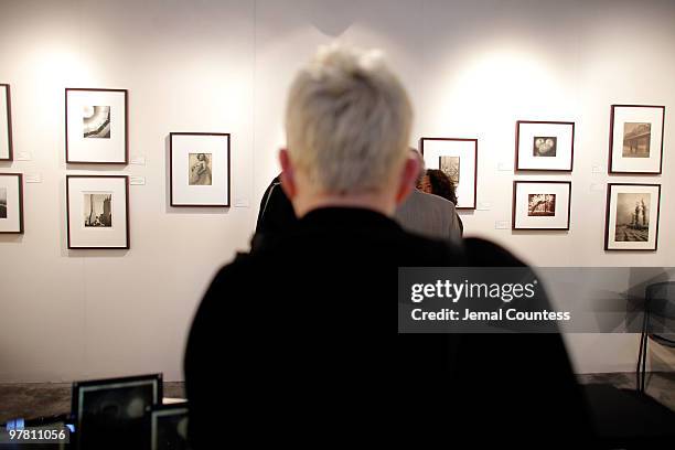 Patrons attend the gala preview of the AIPAD Photography Show at the Park Avenue Armory on March 17, 2010 in New York City.