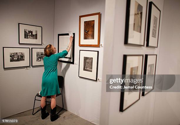 Patrons attend the gala preview of the AIPAD Photography Show at the Park Avenue Armory on March 17, 2010 in New York City.