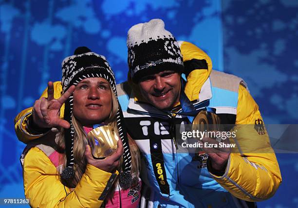 Gold medalist Verena Bentele of Germany and guide Thomas Friedrich celebrate during the medal ceremony for the Women's 12.5km Visually Impaired...