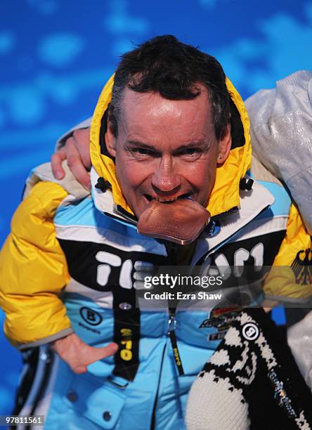 Bronze medalist Josef Giesen of Germany celebrates during the medal ceremony for the Men's 12.5km Standing Biathlon on Day 6 of the 2010 Vancouver...