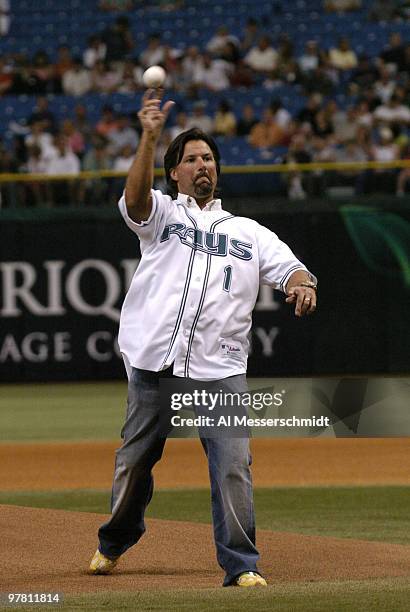 Michael Andretti tosses out the ceremonial first ball as the Tampa Bay Devil Rays host the Toronto Blue Jays in the season opener April 4, 2005.