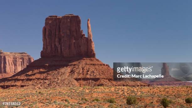 view of west mitten, navajo, arizona, usa - west mitten stock-fotos und bilder