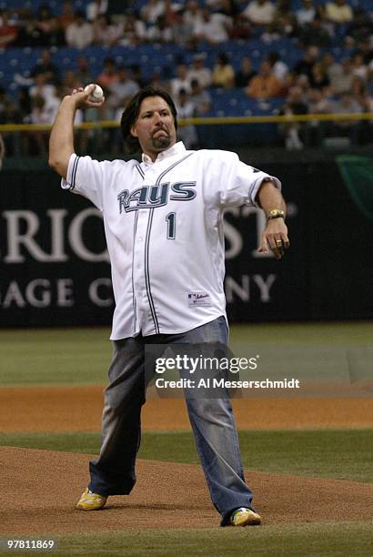 Michael Andretti tosses out the ceremonial first ball as the Tampa Bay Devil Rays host the Toronto Blue Jays in the season opener April 4, 2005.