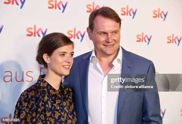 April 2018, Germany, Unterfoehring near Munich: Liv Lisa Fries, actress, and Devid Striesow, actor, arrive at the presentation "Das neue Sky" at pay...