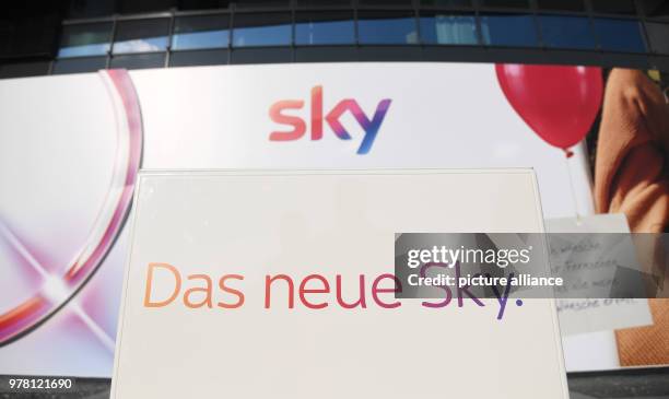 April 2018, Germany, Unterfoehring near Munich: A sign reads "Das neue Sky" outside the broadcaster's offices, pictured during the presentation "Das...