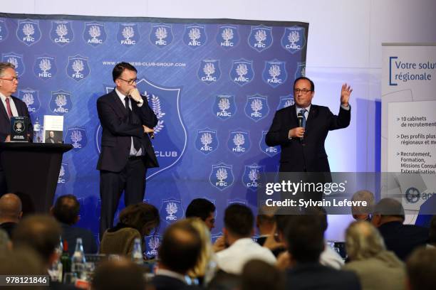 Former French President Francois Hollande delivers a speech during a lunch organized by the 'Flandres Business Club' on June 18, 2018 in Lille,...