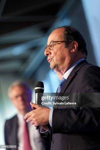 Former French President Francois Hollande delivers a speech during a lunch organized by the 'Flandres Business Club' on June 18, 2018 in Lille,...