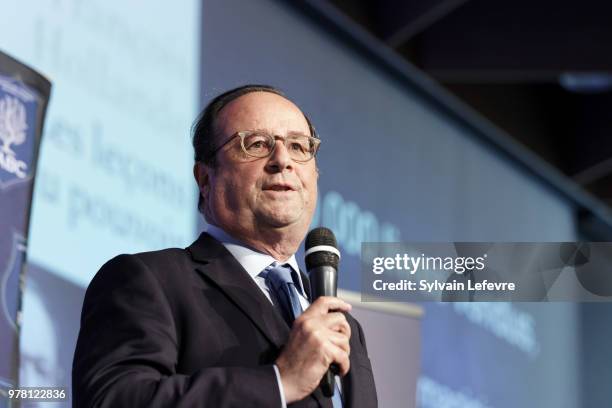 Former French President Francois Hollande delivers a speech during a lunch organized by the 'Flandres Business Club' on June 18, 2018 in Lille,...