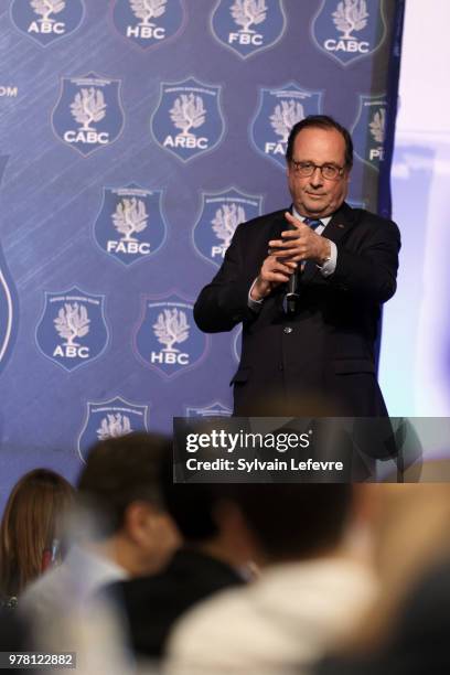 Former French President Francois Hollande delivers a speech during a lunch organized by the 'Flandres Business Club' on June 18, 2018 in Lille,...