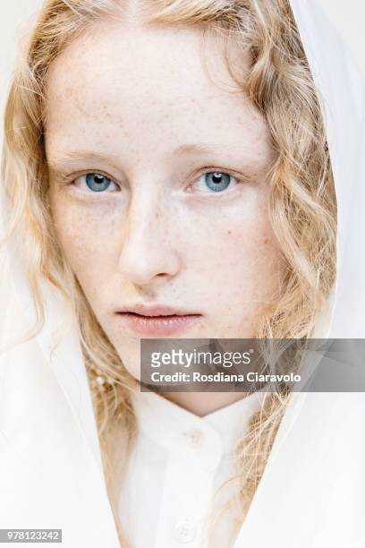 Model is seen backstage ahead of the Aalto show during Milan Men's Fashion Week Spring/Summer 2019 on June 18, 2018 in Milan, Italy.