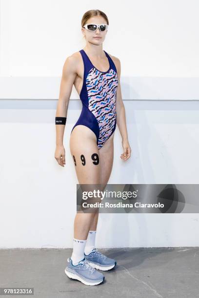 Model is seen backstage ahead of the Aalto show during Milan Men's Fashion Week Spring/Summer 2019 on June 18, 2018 in Milan, Italy.