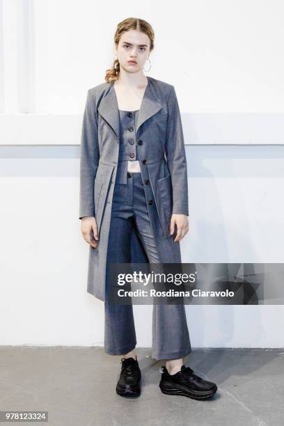 Model is seen backstage ahead of the Aalto show during Milan Men's Fashion Week Spring/Summer 2019 on June 18, 2018 in Milan, Italy.