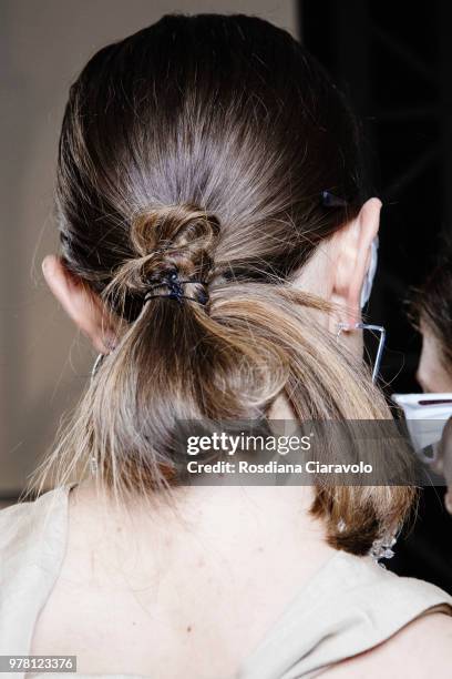 Model, hair detail, is seen backstage ahead of the Aalto show during Milan Men's Fashion Week Spring/Summer 2019 on June 18, 2018 in Milan, Italy.