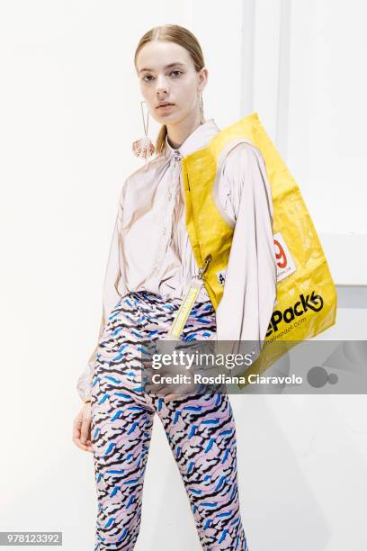 Model is seen backstage ahead of the Aalto show during Milan Men's Fashion Week Spring/Summer 2019 on June 18, 2018 in Milan, Italy.