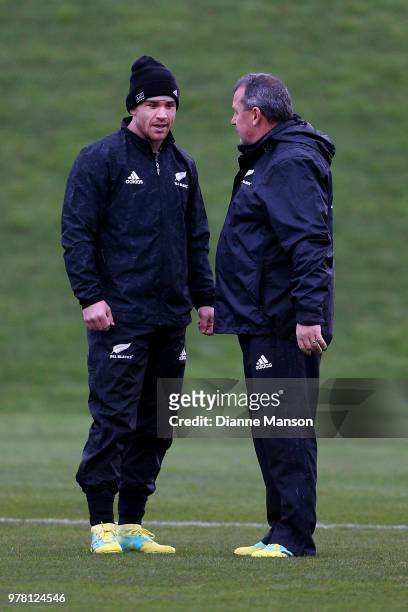 Ryan Crotty of the All Blacks speaks with Assitant Coach Ian Foster during a New Zealand All Blacks training session on June 19, 2018 in Dunedin, New...