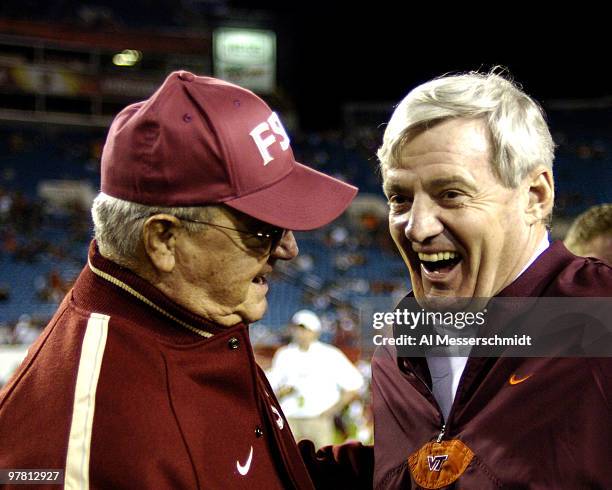 Florida State coach Bobby Bowden and Virginia Tech coach Frank Beamer talk at mid-field during pregame warmups before the 2005 ACC Championship Game...