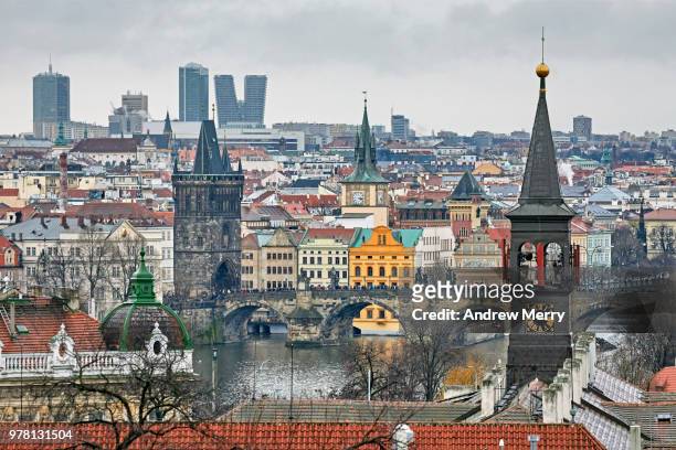 charles bridge, old town bridge tower, clock towers and vltava river, prague - charles town stock pictures, royalty-free photos & images